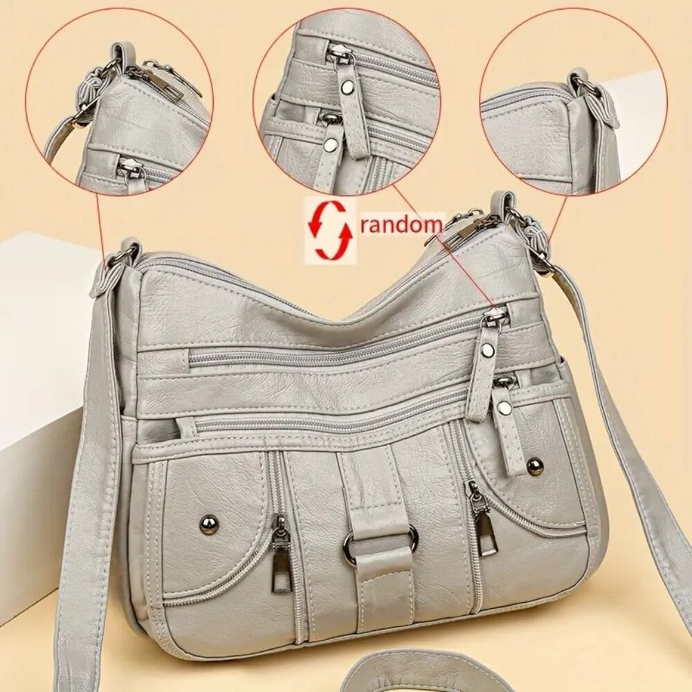 Womans Crossbody faux Leather Bag with adjustable Strap. Grey/NEW.